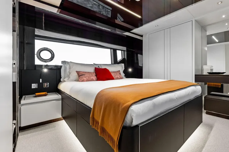 Riva Royale Yacht Photos Pics Luxurious bedroom interior of 2023 Riva 110' Dolcevita yacht with modern design.