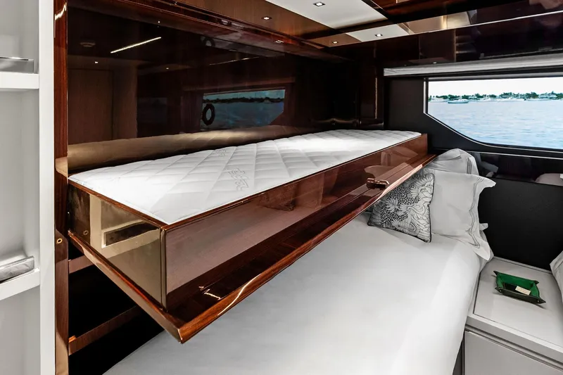Riva Royale Yacht Photos Pics Luxurious cabin interior of 2023 Riva 110' Dolcevita yacht with elegant bedding.