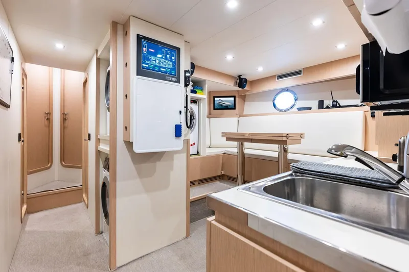 Riva Royale Yacht Photos Pics Luxurious interior of 2023 Riva 110' Dolcevita yacht with modern amenities and elegant design.