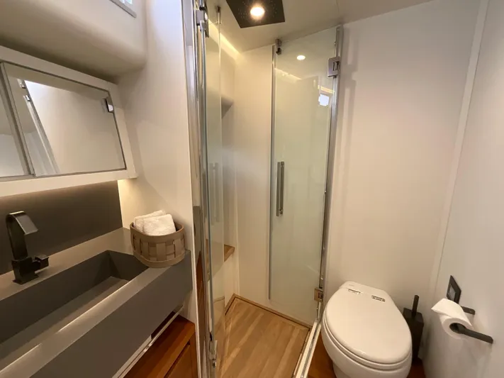  Yacht Photos Pics Modern bathroom in 2020 Pardo Yachts 60 E with shower, sink, and toilet.