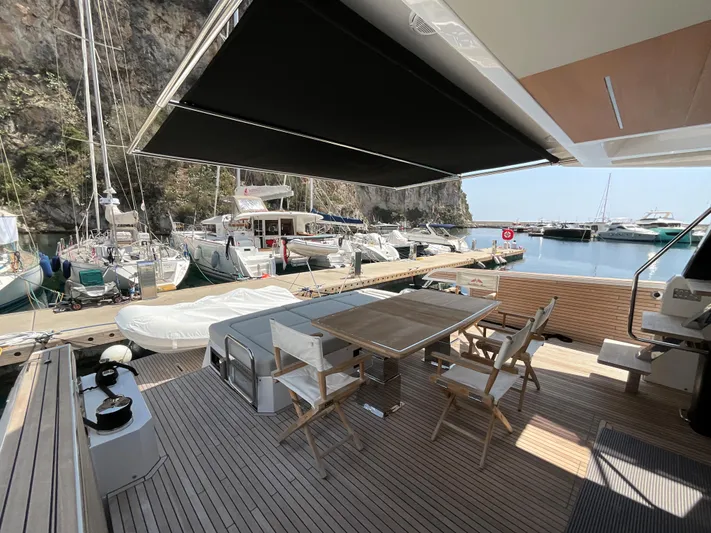  Yacht Photos Pics Luxurious 2020 Pardo Yachts 60 E with elegant deck, docked at scenic marina.