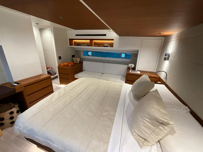  Yacht Photos Pics Luxurious bedroom interior of 2020 Pardo Yachts 60 E with modern design and cozy ambiance.