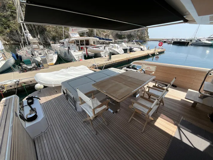  Yacht Photos Pics Luxury deck of 2020 Pardo Yachts 60 E, featuring elegant seating and dining area.