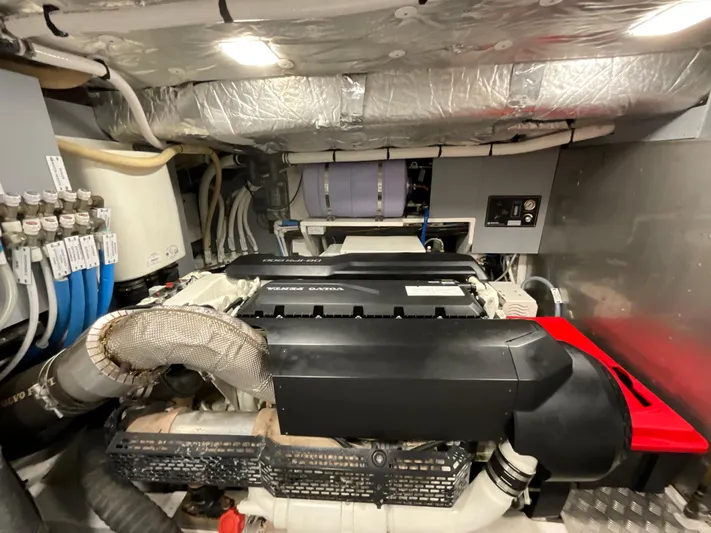  Yacht Photos Pics Engine room of 2020 Pardo Yachts 60 E, showcasing mechanical components and wiring.