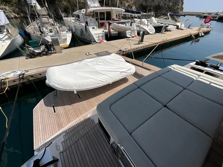  Yacht Photos Pics Luxury Pardo Yachts 60 E, 2020 model, docked with covered tender and spacious deck.