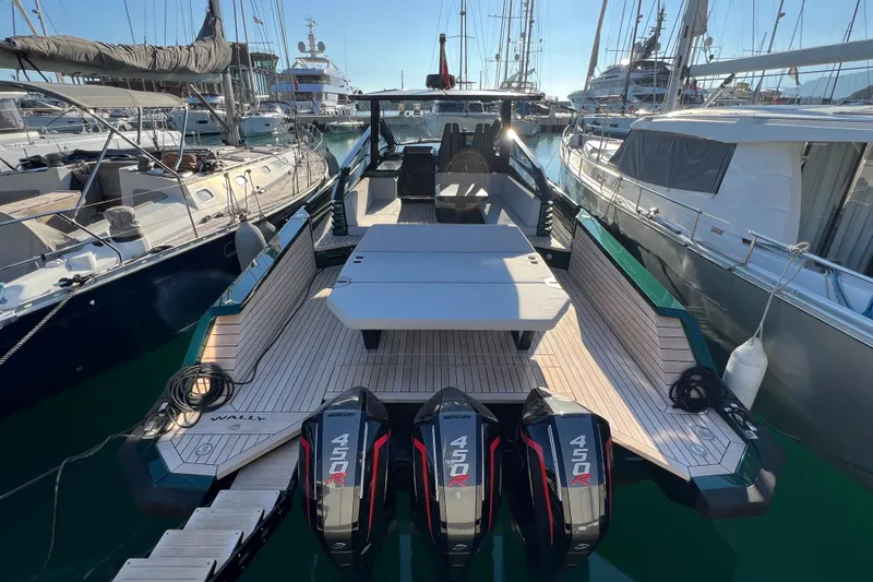  Yacht Photos Pics 2024 Wally Tender 43 X yacht with triple Mercury 450R engines docked in marina.