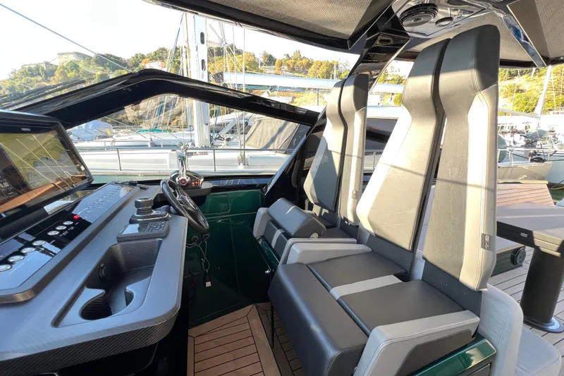  Yacht Photos Pics Interior of 2024 Wally Tender 43 X, featuring modern helm and sleek seating design.