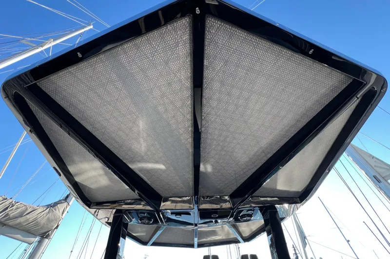  Yacht Photos Pics 2024 Wally Tender 43 X canopy viewed from below, showcasing sleek design against blue sky.