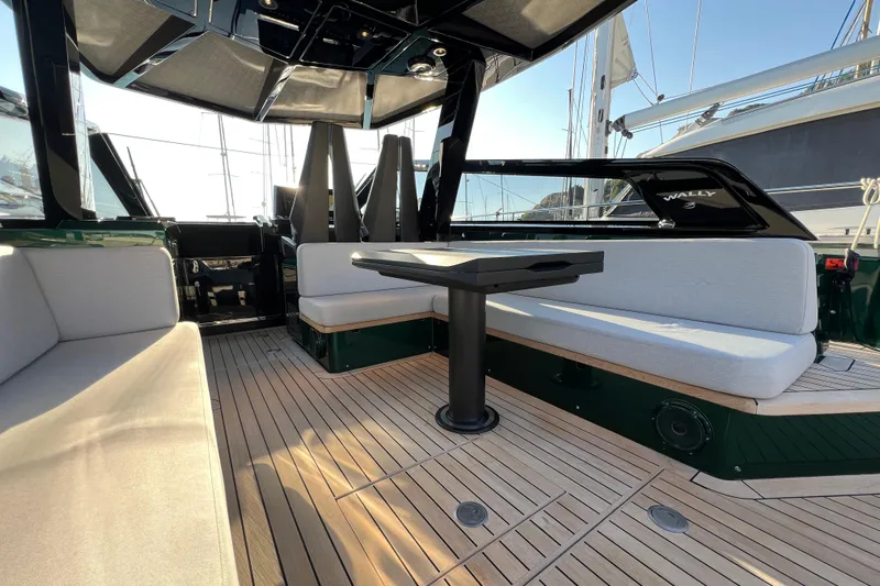  Yacht Photos Pics Luxurious 2024 Wally Tender 43 X yacht interior with elegant seating and table.