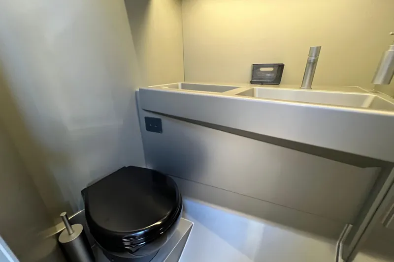  Yacht Photos Pics Modern bathroom interior of 2024 Wally Tender 43 X yacht, featuring sleek fixtures and design.