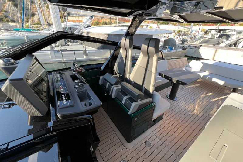  Yacht Photos Pics Luxurious interior of 2024 Wally Tender 43 X yacht with modern seating and controls.