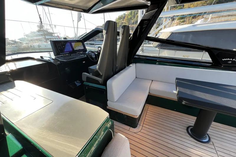  Yacht Photos Pics 2024 Wally Tender 43 X interior with modern seating and navigation system.