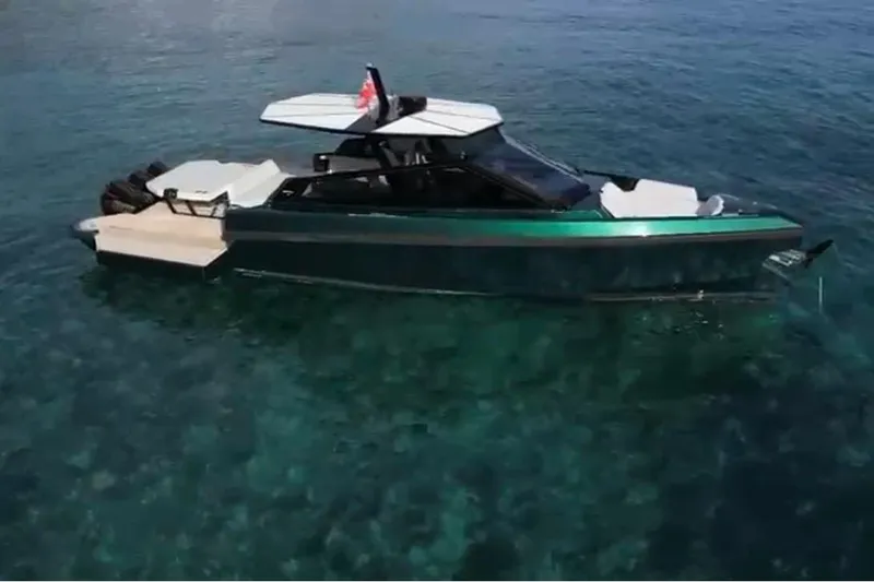  Yacht Photos Pics 2024 Wally Tender 43 X yacht on clear blue water, side view.