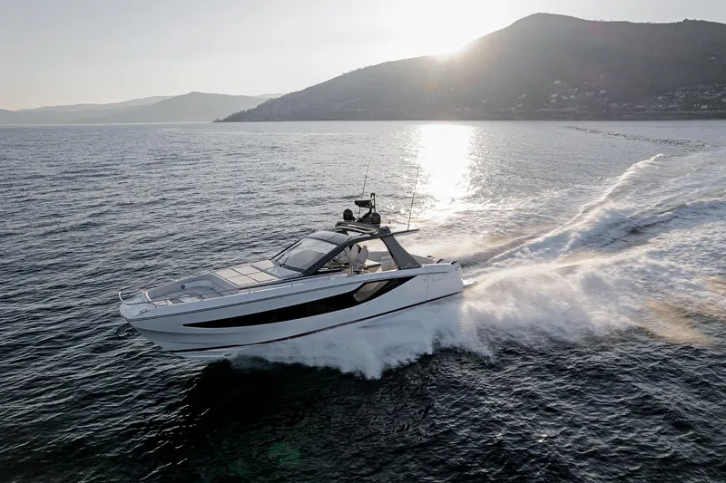  Yacht Photos Pics Azimut Verve 42 yacht cruising on open water at sunset, 2025 model.