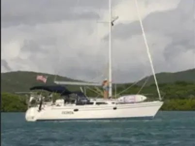 Licentia Yacht Photos Pics 2008 Catalina 42 MkII sailboat on water with scenic background.
