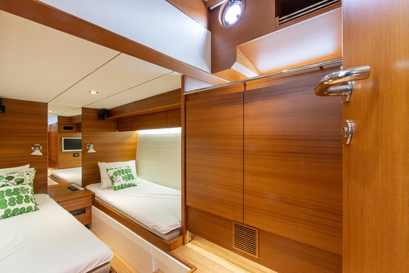  Yacht Photos Pics Luxurious cabin interior of 2011 Delta Powerboats 54 Carbon IPS with wooden finish.