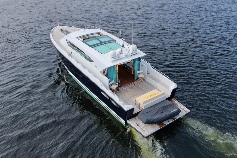  Yacht Photos Pics Aerial view of 2011 Delta Powerboats 54 Carbon IPS yacht cruising on open water.