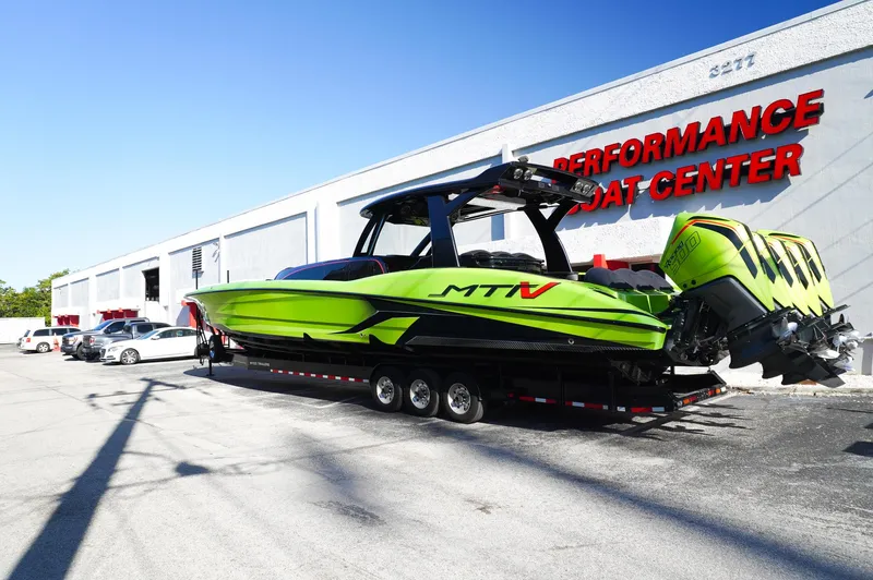  Yacht Photos Pics 2022 MTI 50V Center Console boat in vibrant green at Performance Boat Center.