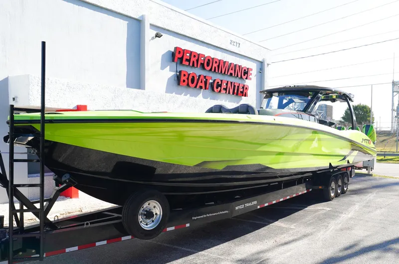 Yacht Photos Pics 2022 MTI 50V Center Console boat in vibrant green at Performance Boat Center.