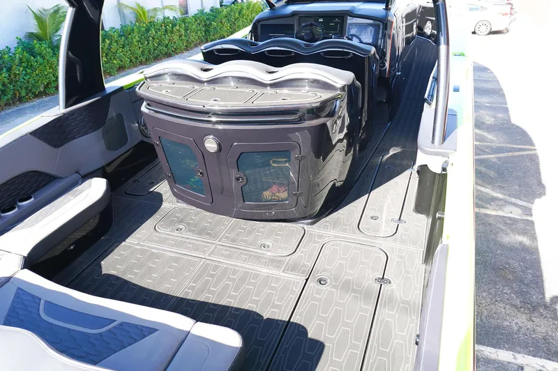  Yacht Photos Pics 2022 MTI 50V Center Console boat interior with seating and storage compartments.