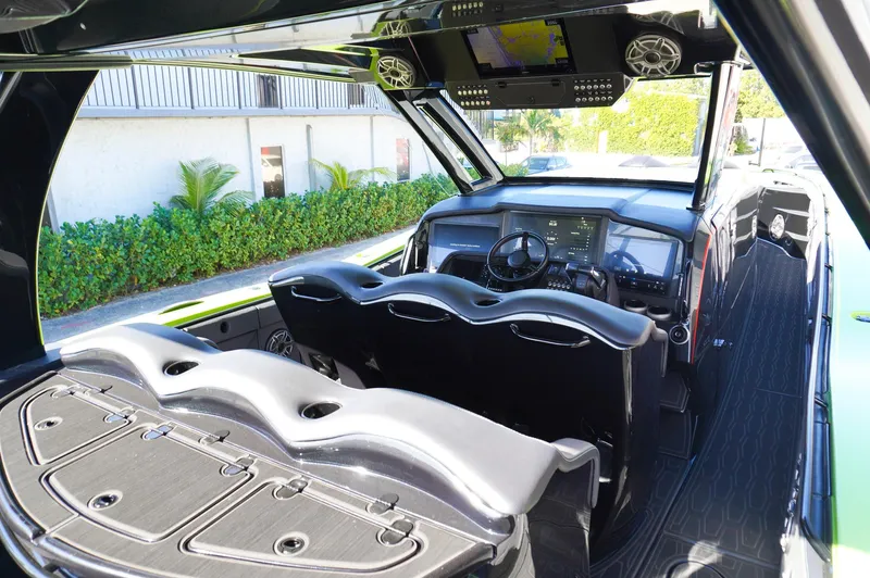  Yacht Photos Pics 2022 MTI 50V Center Console boat interior with sleek design and advanced dashboard.