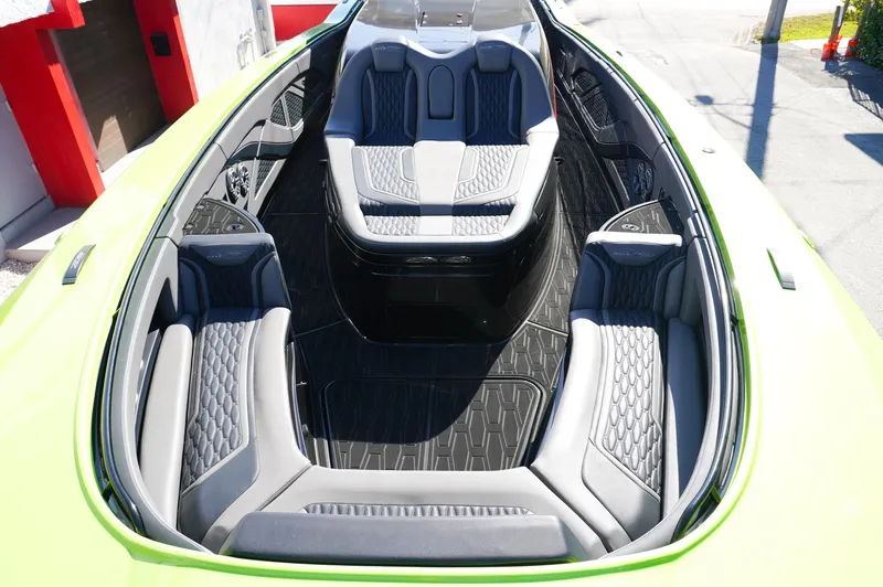  Yacht Photos Pics 2022 MTI 50V Center Console boat interior with sleek seating and modern design.