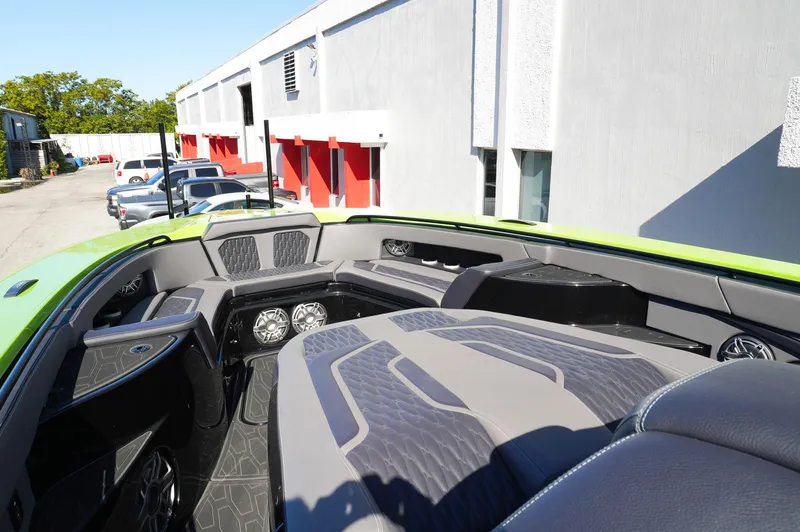  Yacht Photos Pics 2022 MTI 50V Center Console boat interior with modern seating and audio system.