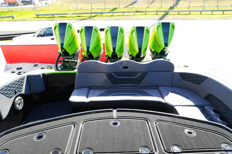  Yacht Photos Pics 2022 MTI 50V Center Console with five vibrant green outboard engines.