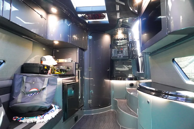  Yacht Photos Pics Luxurious interior of a 2022 MTI 50V Center Console boat with modern amenities.