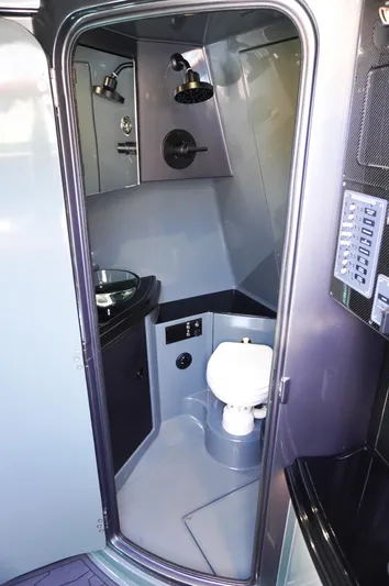  Yacht Photos Pics 2022 MTI 50V Center Console boat interior bathroom with modern fixtures.