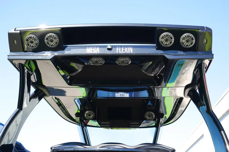  Yacht Photos Pics 2022 MTI 50V Center Console boat with advanced audio system and sleek design.