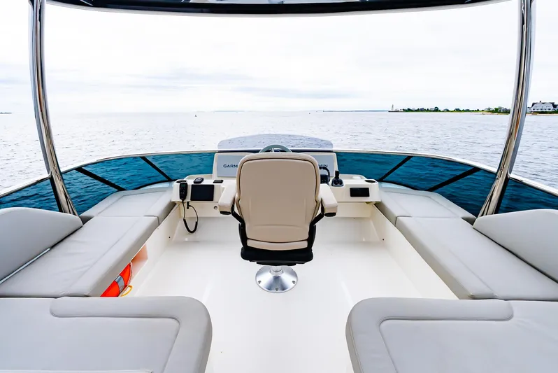 The Transporter Yacht Photos Pics 2023 Absolute 52 Navetta yacht helm with panoramic sea view.