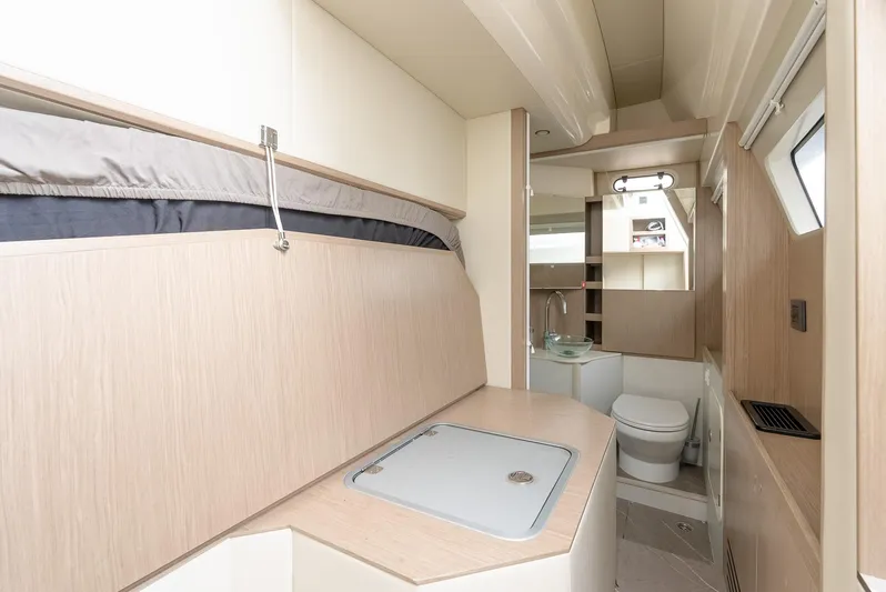 The Transporter Yacht Photos Pics Luxurious bathroom interior of 2023 Absolute 52 Navetta yacht, featuring modern design and amenities.