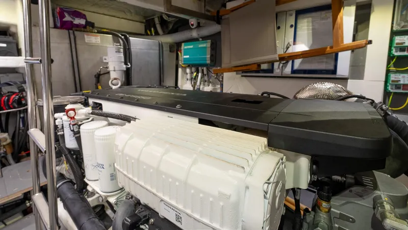 The Transporter Yacht Photos Pics Engine room of 2023 Absolute 52 Navetta yacht, showcasing advanced machinery and equipment.