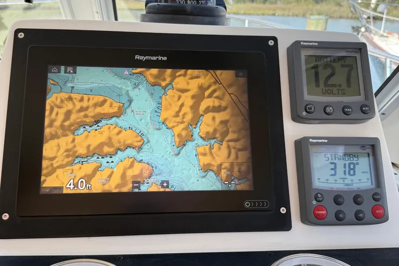 Eventide Yacht Photos Pics Raymarine navigation system on 2007 Back Cove 29 boat, displaying map and instrument readings.