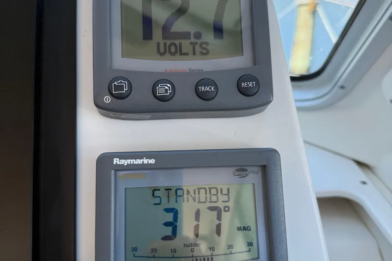 Eventide Yacht Photos Pics Control panel of a 2007 Back Cove 29 boat showing voltage and standby mode.