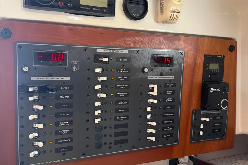 Eventide Yacht Photos Pics Electrical control panel on a 2007 Back Cove 29 boat, featuring various switches and displays.