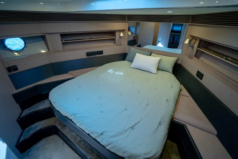  Yacht Photos Pics Luxurious bedroom interior of 2015 Riva 63 Virtus yacht with modern design.