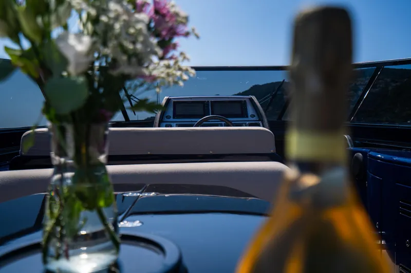  Yacht Photos Pics Luxurious 2015 Riva 63 Virtus yacht interior with flowers and champagne.