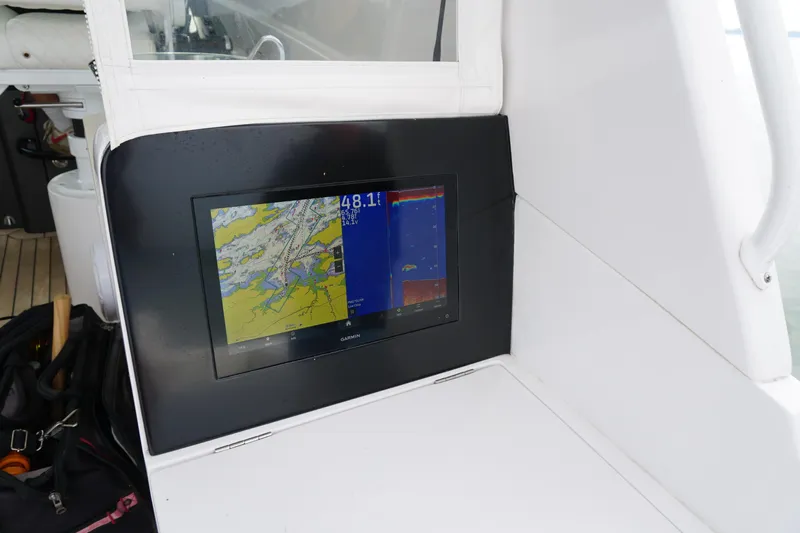  Yacht Photos Pics Garmin navigation display on 2021 Jupiter 41 SB boat, showing map and sonar data.