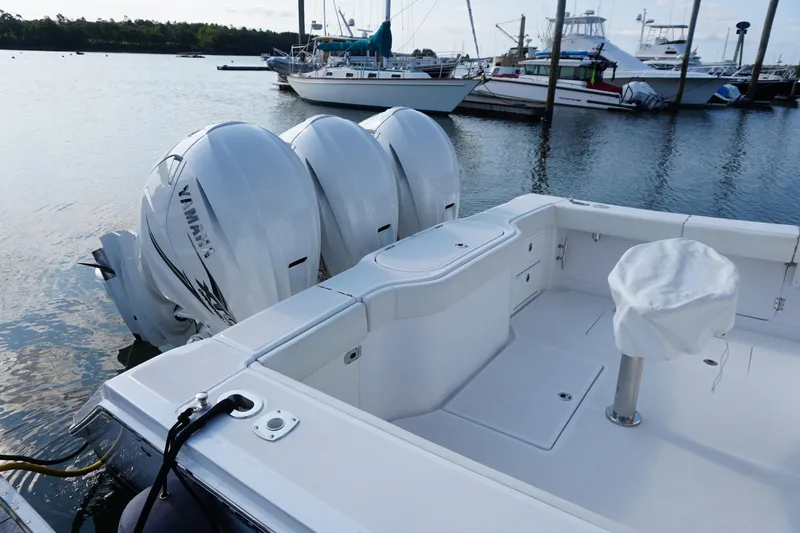 Yacht Photos Pics 2021 Jupiter 41 SB boat with triple Yamaha outboard engines docked at marina.