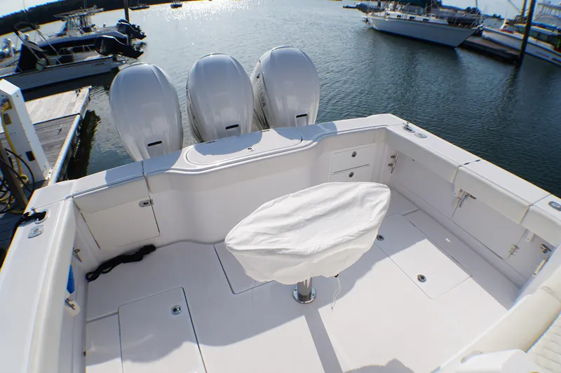  Yacht Photos Pics Jupiter 41 SB 2021 with triple outboard engines at dock.