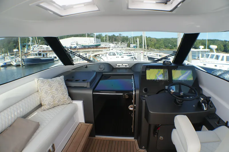  Yacht Photos Pics Interior of a 2021 Jupiter 41 SB yacht with modern helm console.