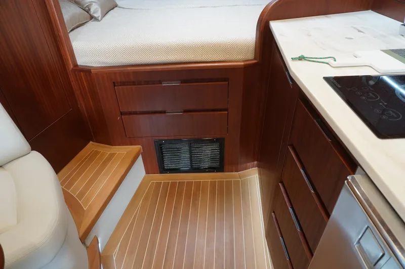  Yacht Photos Pics Interior of 2021 Jupiter 41 SB yacht with wooden flooring and cabinetry.