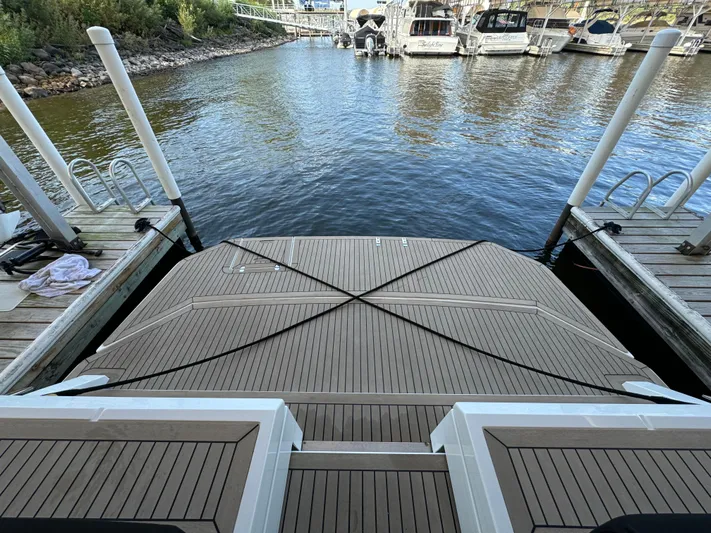 Yacht Rock Yacht Photos Pics 2015 Cruisers Yachts 390 Express Coupe docked at marina, rear view.