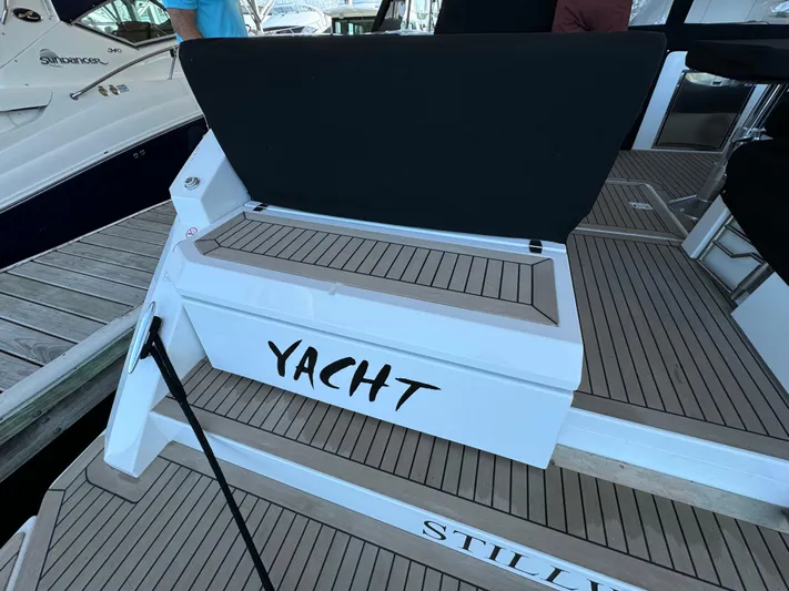Yacht Rock Yacht Photos Pics 2015 Cruisers Yachts 390 Express Coupe, docked with "Yacht" text on the deck.