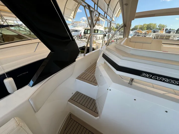 Yacht Rock Yacht Photos Pics 2015 Cruisers Yachts 390 Express Coupe interior with steps and seating area.