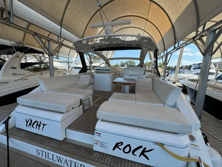 Yacht Rock Yacht Photos Pics 2015 Cruisers Yachts 390 Express Coupe with spacious deck and seating under canopy.