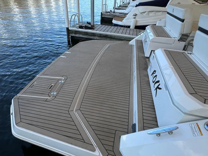 Yacht Rock Yacht Photos Pics 2015 Cruisers Yachts 390 Express Coupe, teak deck, docked at marina.