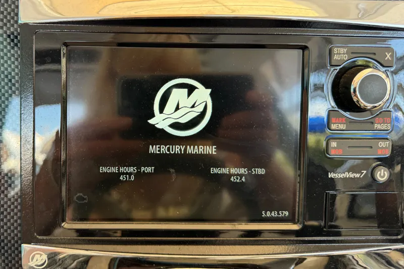 Yacht Rock Yacht Photos Pics Mercury Marine display on 2015 Cruisers Yachts 390 Express Coupe showing engine hours.